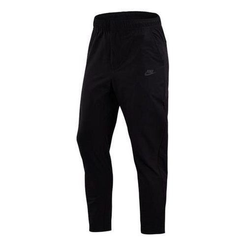nike woven commuter trousers